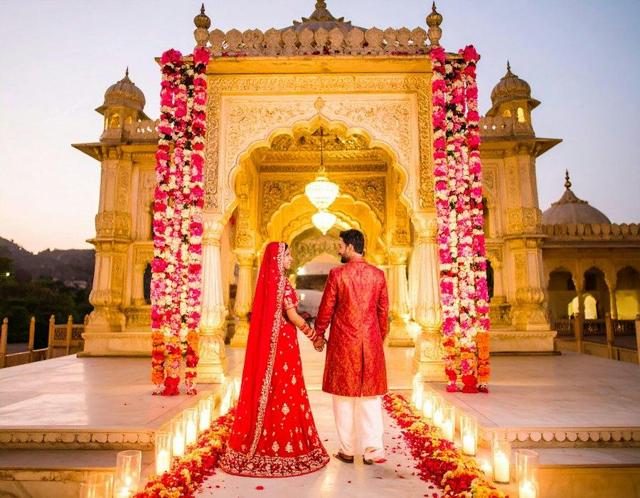 Bride and groom walking at a palace venue